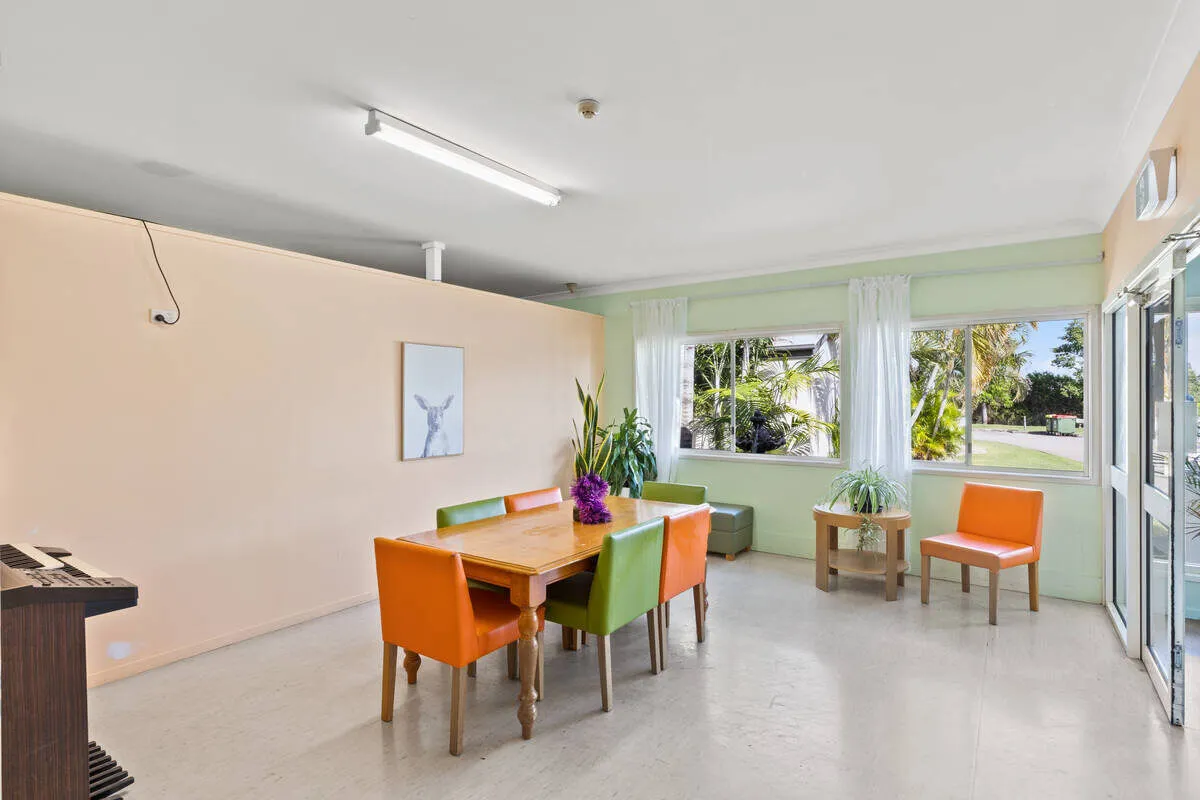 Bright shared dining and activity space at Christine Court